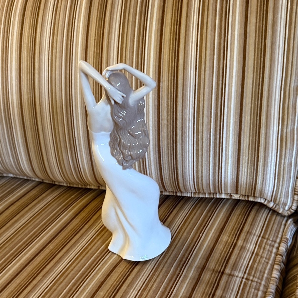 Graceful Cream Sculpture with Floral Accent - Picture 4 of 6